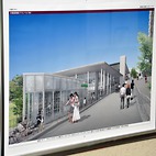 <span class="qrinews-figure-title">2013年9月11日 新キャンパス建物完成イメージ図</span>　理学部1号館の入り口辺りに、伊都キャンパスに建てられる理学部のイメージ図が飾られていました。また、理学部のホームページの伊都キャンパスへの移転情報も更新されています。モス、ローソン、ドトール、ミスド、などの名前が見られました。（撮影場所：<a href="http://maps.google.co.jp/maps?q=33.626332,130.425337+(理学部一号館)&z=18" target="_blank">理学部1号館</a>）